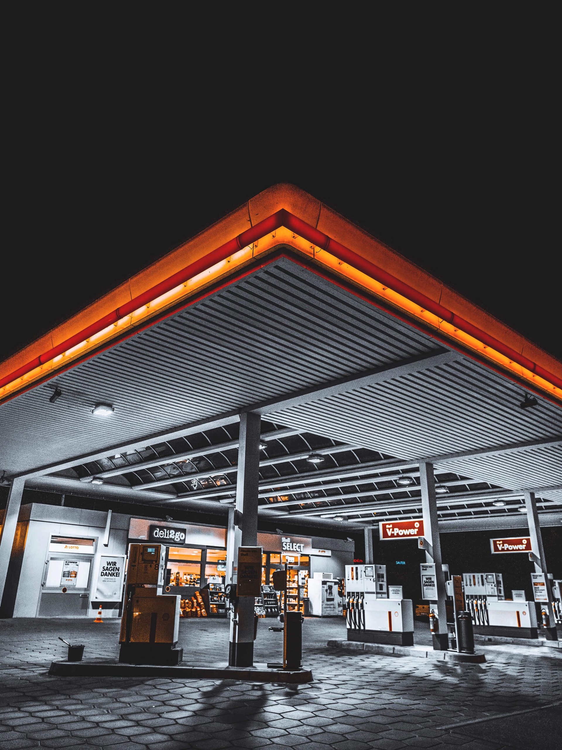 Well-lit gas station at night